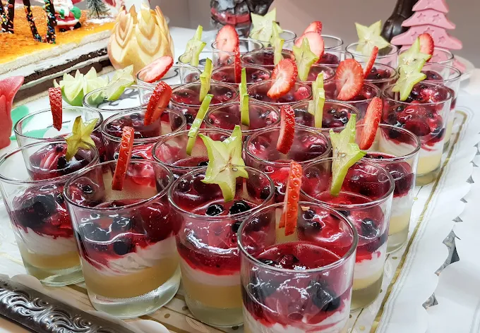 Layered fruit and berry desserts served in glasses at Ambassador Playa 2 buffet