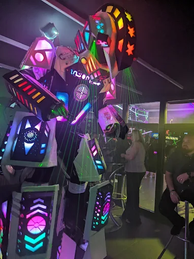 Giant LED robot mascot inside Insomnia Benidorm