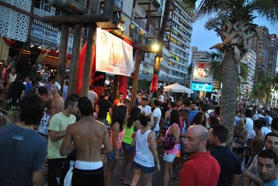 Beach party crowd outside KU Benidorm on Levante seafront